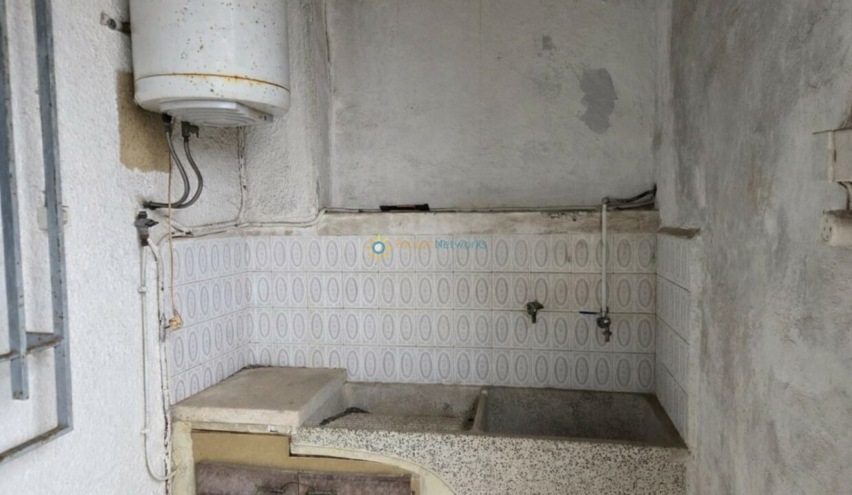 Cocina envejecida y desgastada