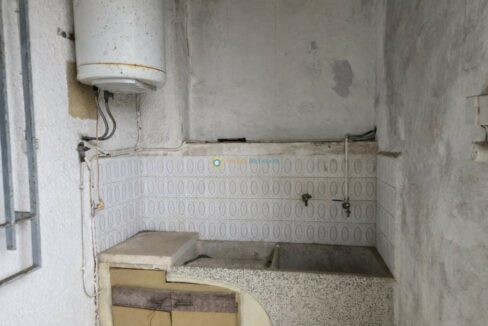 Cocina envejecida y desgastada