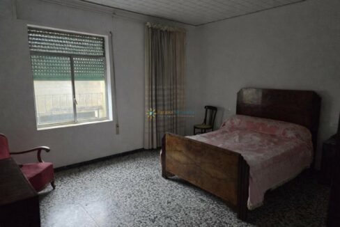 Dormitorio acogedor con detalles vintage