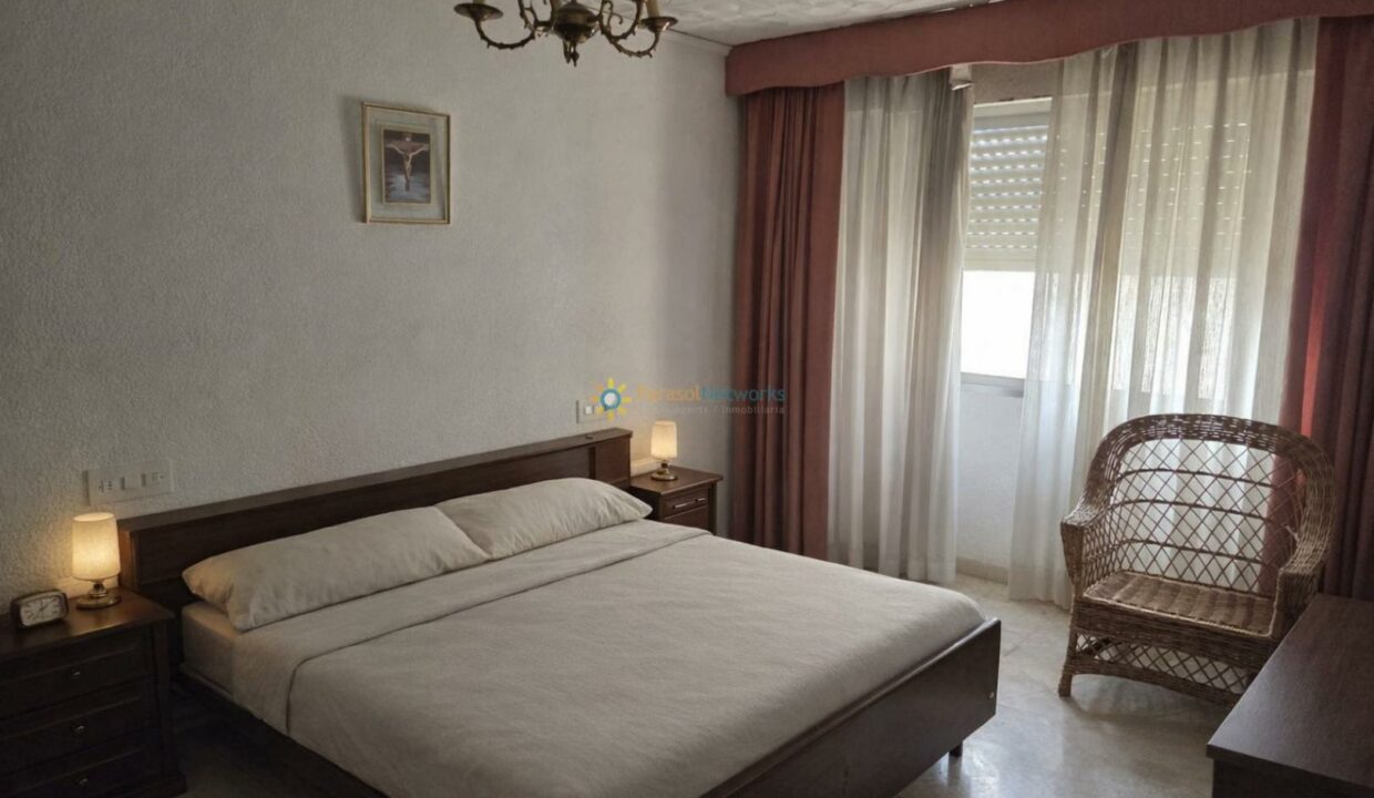 Dormitorio acogedor con luz natural