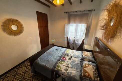 Dormitorio mediterráneo con toques vintage