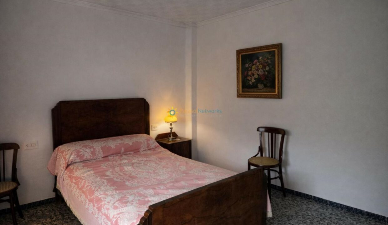 Dormitorio vintage con detalles florales