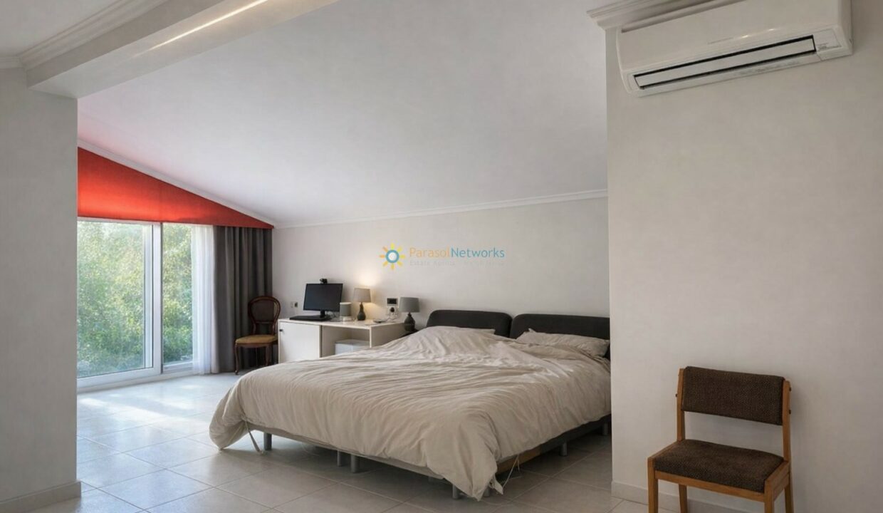 Habitación moderna con toques rojos