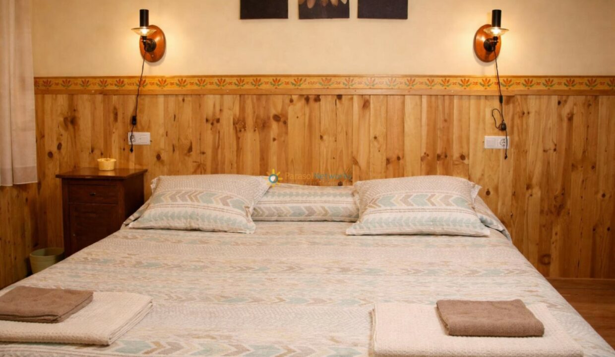 Habitación rústica acogedora y cálida