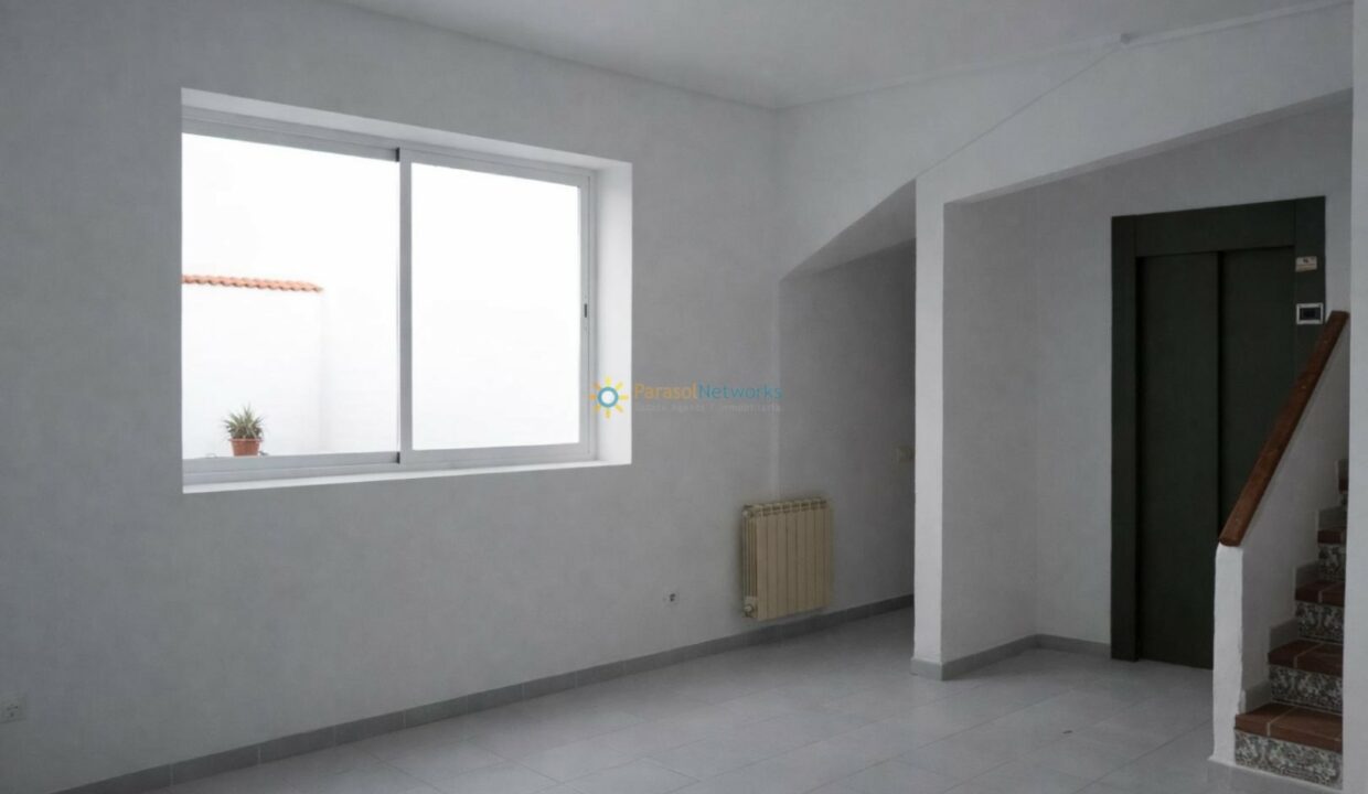 Sala luminosa con escaleras decoradas